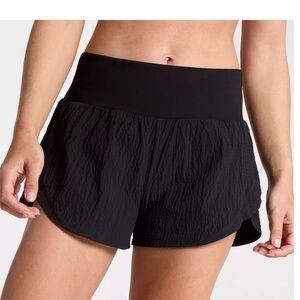 Calia Women’s Kick It Up Mid Rise Short
